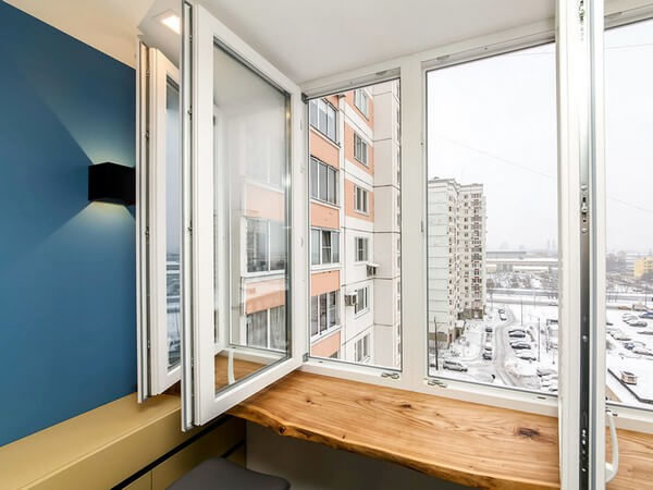 Двойные балконные двери – варианты конструкций