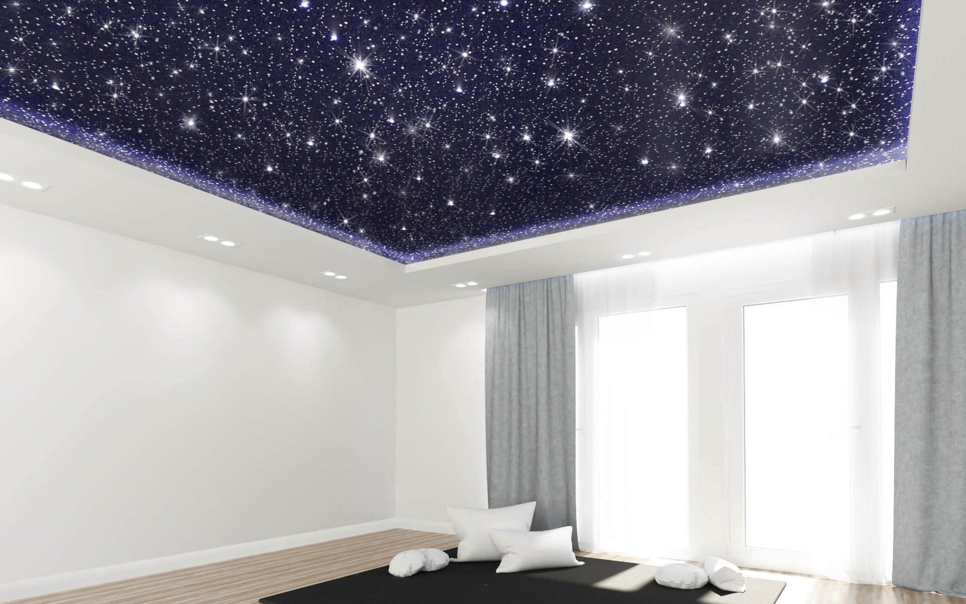 Звездное небо - натяжной потолок, украшающий помещение.